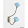 Silver And Ceramic Coat Hooks